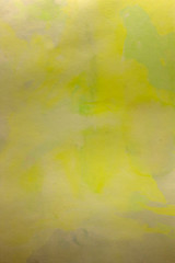 This is a photograph of a Green and Yellow abstract background created using watercolours