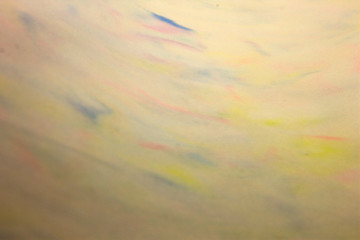 This is a photograph of a Blue,Pink and Yellow abstract background created using watercolours