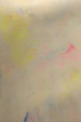 This is a photograph of a Blue,Pink and Yellow abstract background created using watercolours
