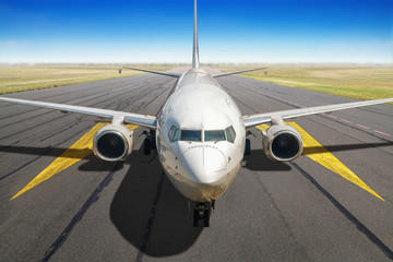 Fototapeta na wymiar modern airliner on a runway