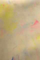 This is a photograph of a Blue,Pink and Yellow abstract background created using watercolours