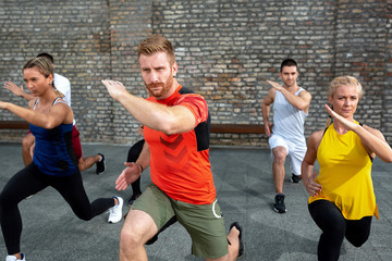 Group of people warming up for a workout