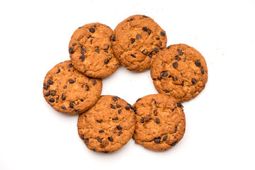Oatmeal raisin cookies isolated on a white background.
