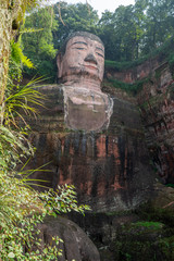 Leshan Giant Buddha ruins is a 71 meter tall stone statue carved from cliff face