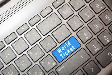 Blue button on the computer with the text World Ticket