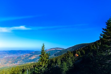 Mountains Karkonosze in Poland . A journey on foot to the top of the mountain. Lifestyle. Go to the target . In autumn view from mountain peaks . 
