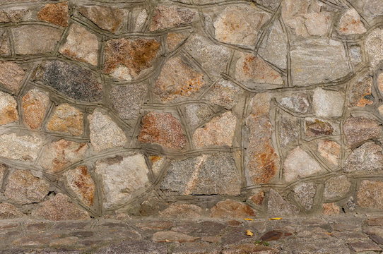 Stone granite wall. Background image.