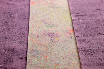 Fototapeta premium This is a photograph of a shiny textured Purple and White striped background created using acrylic paint and sprinkled with pastel colored pigments