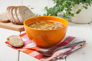 Traditional polish tripe soup with vegetables.