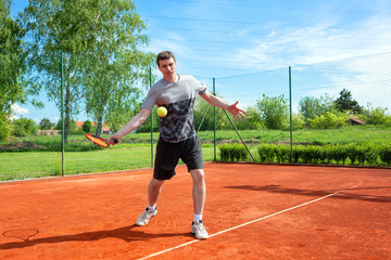 Naklejka premium Tennis player approaching for a forehand shot
