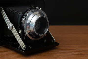 Fototapeta na wymiar Classic Vintage Medium Format Folding Camera with A 120mm Film