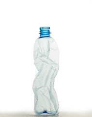 Close up of a plastic bottle on white background