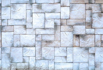 The surface is tiled with tiles of different sizes and shapes