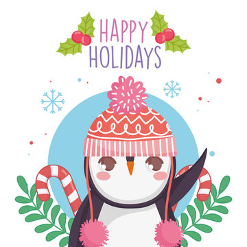 cute penguin with warm hat candy canes merry christmas