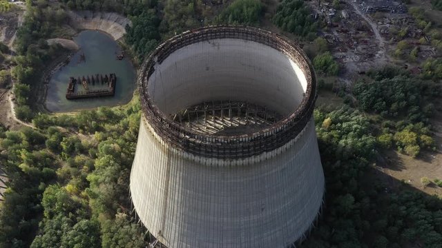 Cooling tower shot by a drone from above in the abandoned city of Pripyat