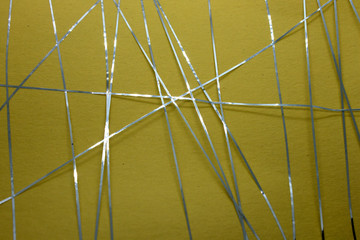 This is a photograph of a geometric design created using Blue tape applied onto a Yellow paper