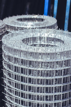 Welded mesh rolls in a hardware warehouse