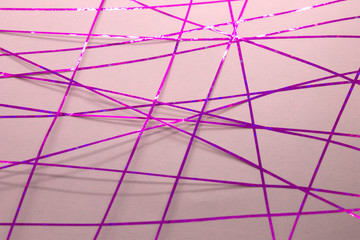 This is a photograph of a geometric design created using Purple tape applied onto a Pink paper
