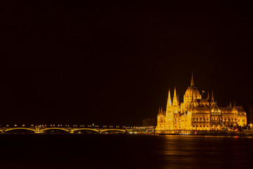 Obraz premium Hungarian parliament in budapest at night, europe, lights, architecture, city, travel, panorama, river, marketing concept, social media.