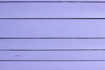 Obraz na płótnie Canvas Texture of nailed wooden panels painted in violet