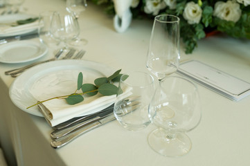 Simple wedding table decor in a restaurant.
