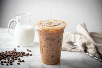 iced coffee in disposable plastic cup