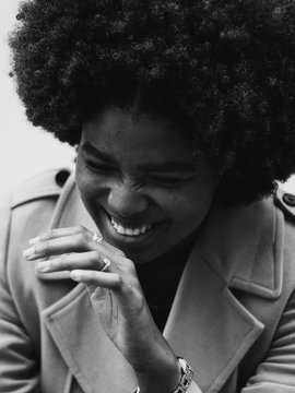 Monochrome portrait of woman with afro hair style