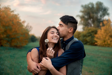 Young happy couple in nature