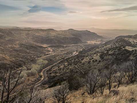 Road in hilly landscape, Texas, USA