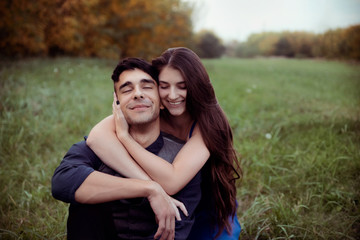 Young happy couple in nature