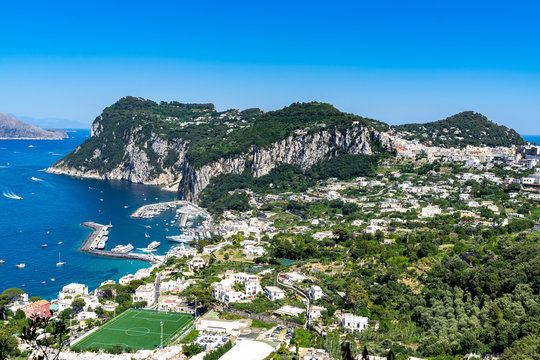 Panoramic view of Capri Island from the Scala Fenicia (Phoenician Steps). On the left Marina Grande and Punta del Capo, on the right Capri town