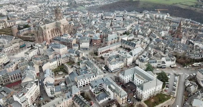 Aerial view of French city of Rodez with tower of Cathedral and spire of church of Saint Amans in autumn day