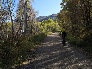 Landscape with an asian guy cycling around Sardine Peak Trailhead