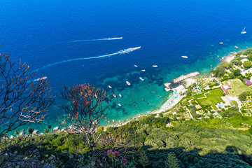 Fototapeta na wymiar Aerial view of the beautiful coastline of Capri. Capri is one of the most popular tourist destination of Southern Italy