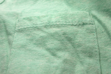 This is a photograph of textured light Green fabric