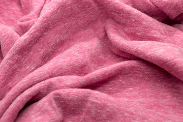 This is a photograph of textured light Pink fabric