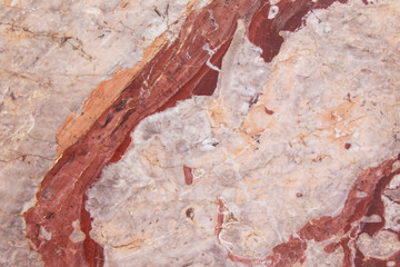 Abstract pink red beige marble texture background. Natural stone pattern	