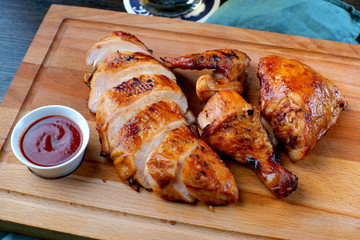 grilled chicken on wooden pallet