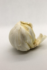 This is a photograph of a Garlic isolated on a White background