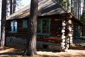 Log cabin built with huge ponderosa pines, shuttered up for the winter months ahead.on Lake Tahoe.