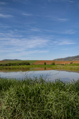landscape with lake and blue sky