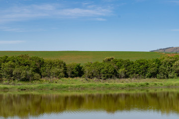 landscape with lake and blue sky