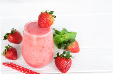 Strawberry smoothies colorful pink fruit juice beverage healthy the taste yummy In glass drink episode morning on white background.