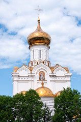 Fototapeta na wymiar Golden dome of the Church of the Holy Martyr Grand Duchess Elizabeth in Khabarovsk