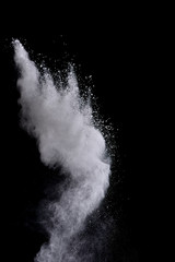 Explosion of colored powder isolated on black background. Abstract colored background. holi festival.