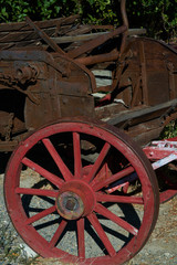 Fototapeta na wymiar Steel wagon with wood spoke wheels