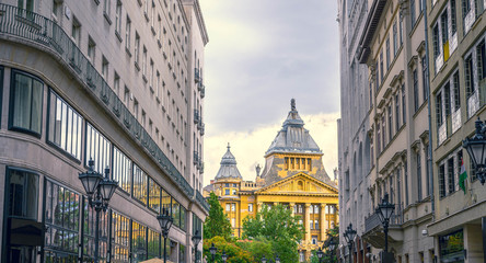 European street of Budapest in Hungary with historic buildings of the downtown in early autumn