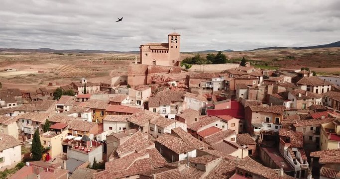 Aerial view of gothic Mudejar Catholic parish church of Santa Tecla in Spanish village Cervera de la Canada