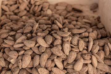 Salted almonds, unpeeled, in bulk in a street market