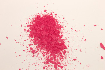 This is a photograph of Fuschia Pink powder Blusher isolated on a White background